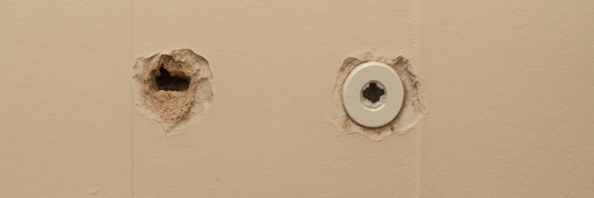 How to fix pulled out drywall anchors